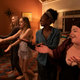 From left: Suki Waterhouse, Carly Chaikin, Kirby Howell-Baptiste, and Melissa Bergland. Chaikin plays a “wellness guru” who’s found fame on social media, to the chagrin of her former high-school besties.